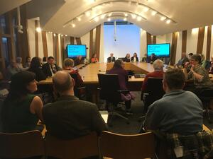 Picture of a room inside the Scottish Parliament with attendees facing a panel of speakers including Christine Grahame MSP and Maree Todd MSP